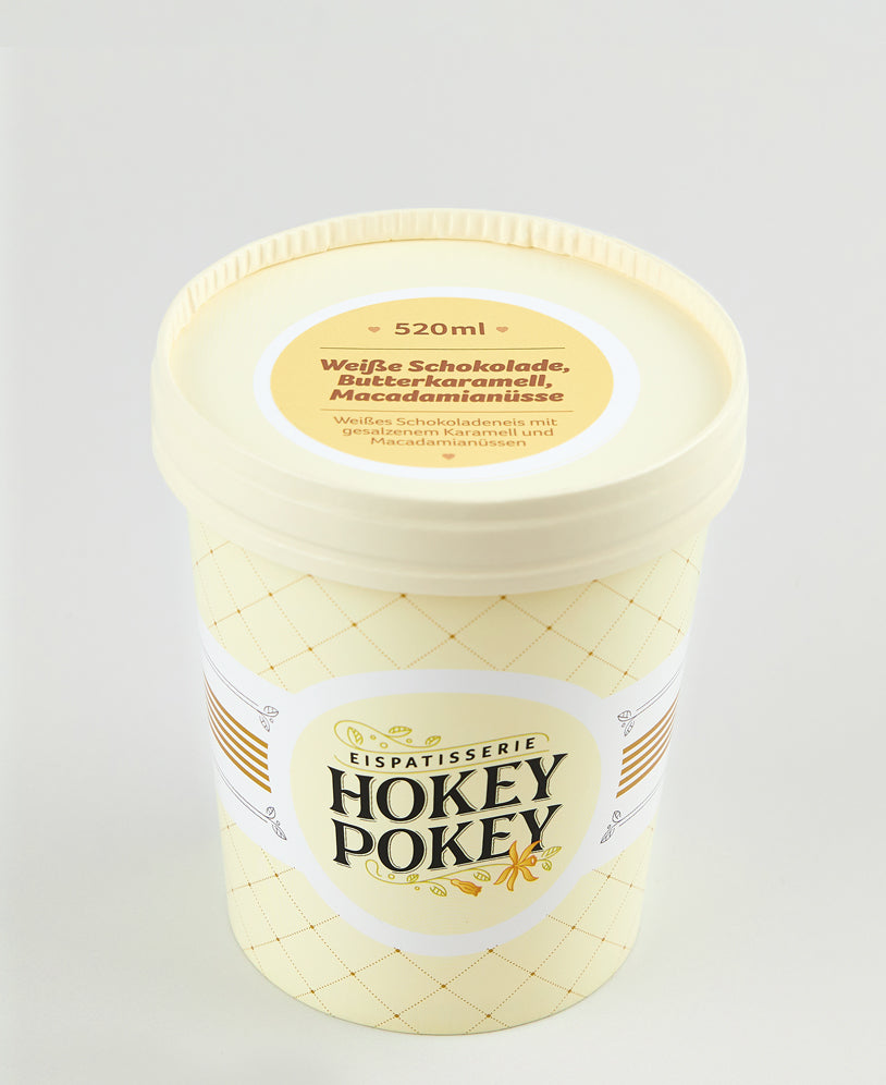 Eisbecher von Hokey Pokey mit weißem Schokoladeneis, gesalzenem Butterkaramell und Macadamianüssen – 520 ml Feinschmecker-Genuss in stilvollem Design.